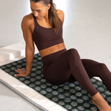 Matte med jade- og turmalinsteiner.