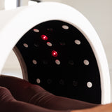 Nærbilde av rødt og infrarødt lys inni IR Therapy Ellipse