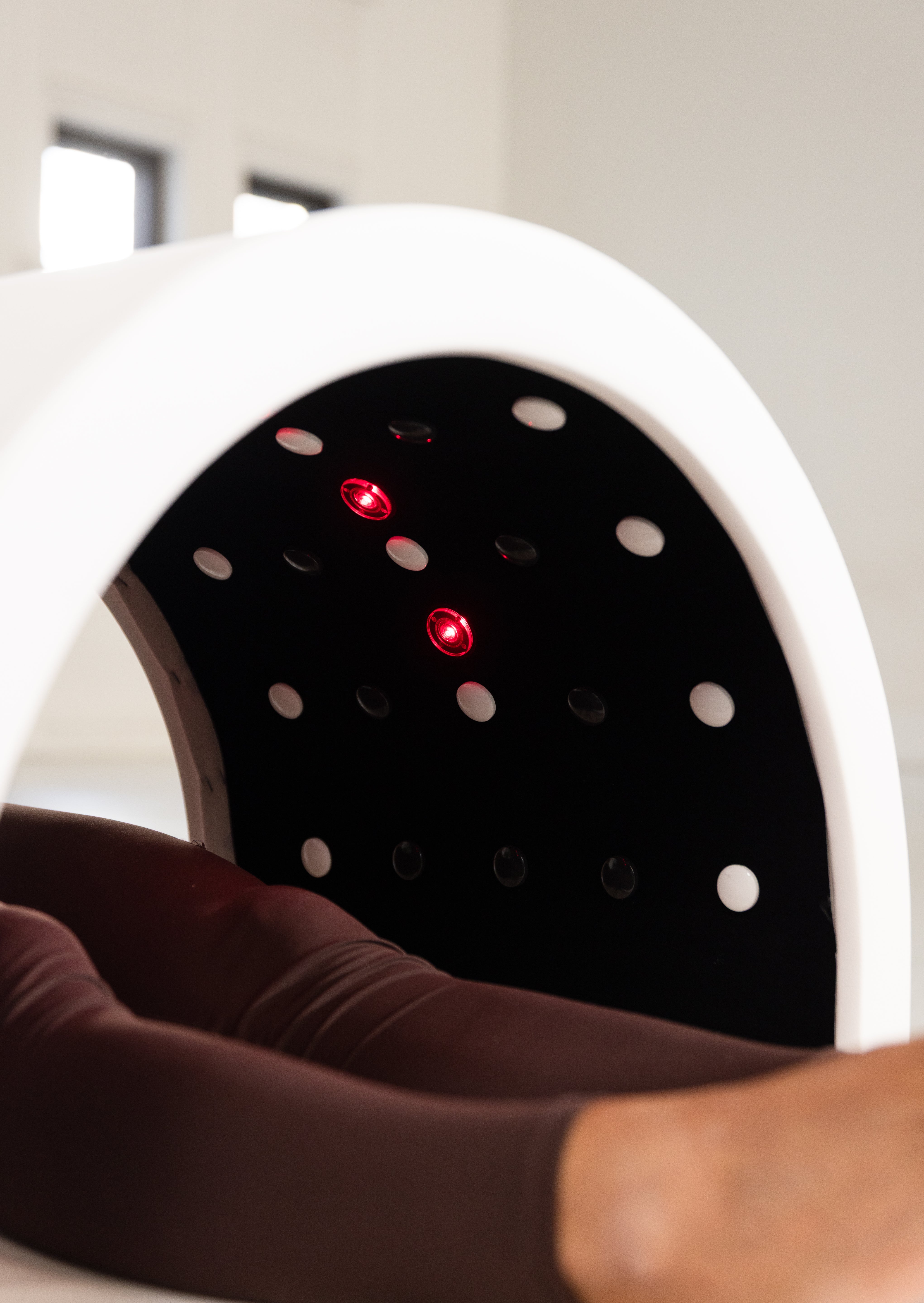 Nærbilde av rødt og infrarødt lys inni IR Therapy Ellipse