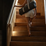 Elegant bag med infrarød yogamatte, designet for enkel transport og aktive dager.