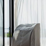 Bamboo Stone sauna med naturlig lys, sofistikert grånyanse som smelter inn i hjemmet.